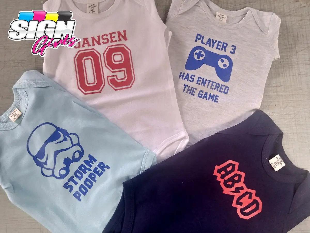 Printed baby onesies with custom names and graphics by Sign Girls