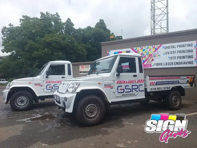 GSRC branded work trucks with custom vehicle decals