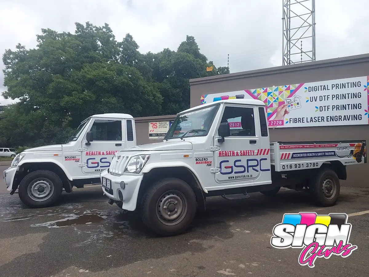 GSRC branded work trucks with custom vehicle decals